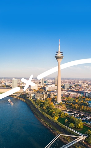 View of the Düsseldorf TV Tower (Rheinturm), a prominent landmark in the city skyline.