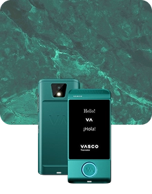 A product showcase image featuring a turquoise Vasco Translator device from two angles against a dark, textured fabric background. The device on the left shows the back view, highlighting a camera lens with a flash and an embossed 